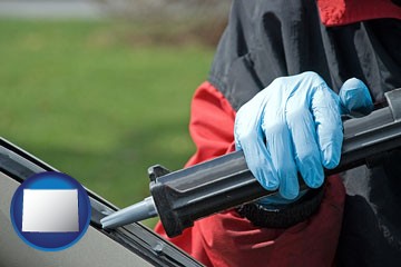 an automobile windshield repair - with Wyoming icon