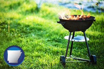 a round barbecue grill - with Arkansas icon