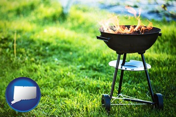 a round barbecue grill - with Connecticut icon