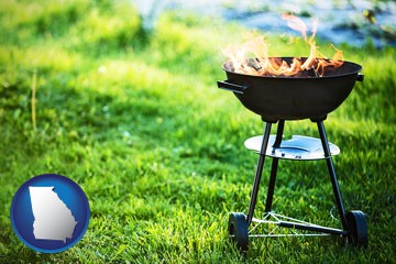 a round barbecue grill - with Georgia icon