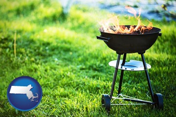 a round barbecue grill - with Massachusetts icon