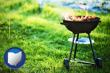 a round barbecue grill - with Ohio icon
