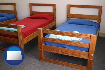 summer camp beds - with North Dakota icon