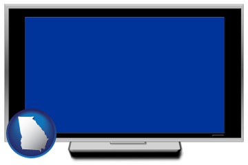 a big screen television with a blue screen - with Georgia icon