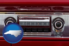 north-carolina map icon and a vintage car radio