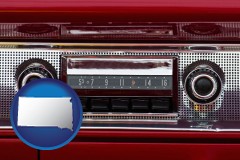 south-dakota map icon and a vintage car radio