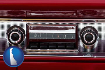 a vintage car radio - with Delaware icon