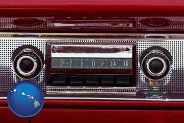 a vintage car radio - with Hawaii icon