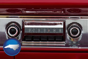 a vintage car radio - with North Carolina icon
