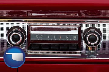 a vintage car radio - with Oklahoma icon