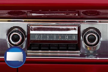 a vintage car radio - with South Dakota icon