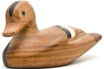a carved wood duck decoy