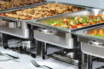 chafing dishes on a banquet table