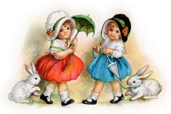 two little girls wearing vintage clothing and bonnets