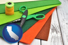 california craft supplies (colorful felt and a pair of scissors)