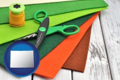 colorado craft supplies (colorful felt and a pair of scissors)