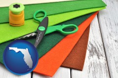 florida craft supplies (colorful felt and a pair of scissors)