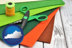 kentucky map icon and craft supplies (colorful felt and a pair of scissors)