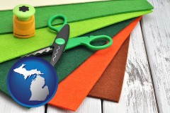 michigan craft supplies (colorful felt and a pair of scissors)