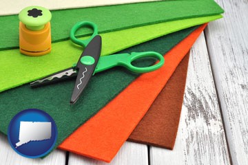 craft supplies (colorful felt and a pair of scissors) - with Connecticut icon