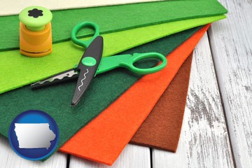 craft supplies (colorful felt and a pair of scissors) - with Iowa icon