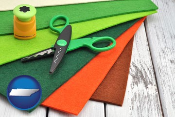craft supplies (colorful felt and a pair of scissors) - with Tennessee icon