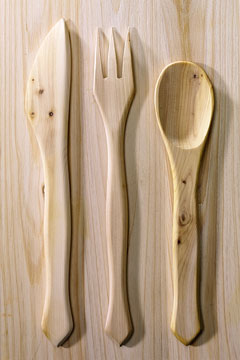 a wooden knife, fork, and spoon