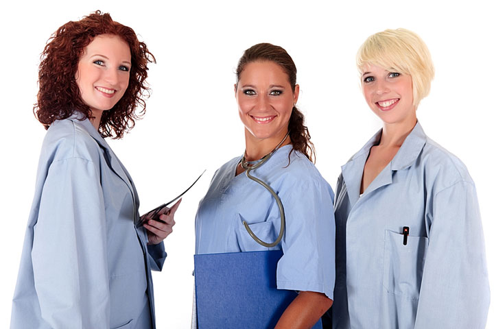 three female doctors wearing hospital uniforms (large image)