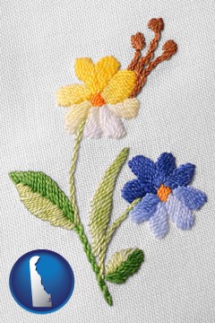 hand-embroidered needlework - with Delaware icon