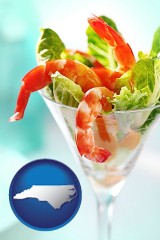 north-carolina map icon and a shrimp cocktail