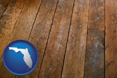 florida map icon and a distressed wood floor