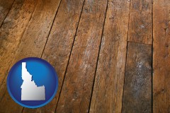 idaho map icon and a distressed wood floor