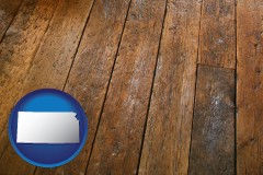 kansas map icon and a distressed wood floor