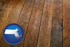 massachusetts map icon and a distressed wood floor