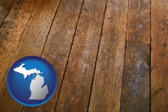 michigan map icon and a distressed wood floor