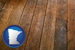 minnesota map icon and a distressed wood floor