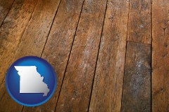 missouri map icon and a distressed wood floor