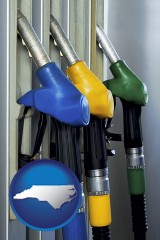 north-carolina map icon and gasoline pumps