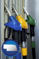 nebraska map icon and gasoline pumps