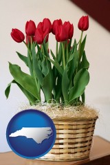 north-carolina a gift basket with red tulips