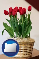 oregon map icon and a gift basket with red tulips