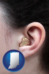 indiana map icon and a woman wearing a hearing aid in her left ear
