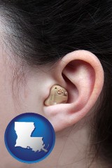 louisiana map icon and a woman wearing a hearing aid in her left ear