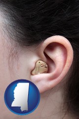 mississippi a woman wearing a hearing aid in her left ear