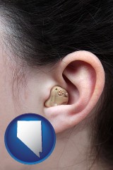 nevada map icon and a woman wearing a hearing aid in her left ear