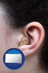 south-dakota a woman wearing a hearing aid in her left ear
