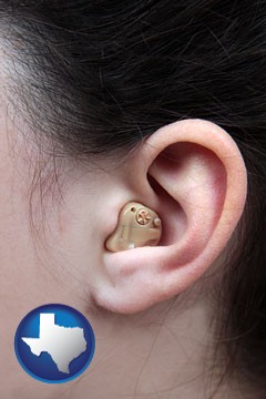 a woman wearing a hearing aid in her left ear - with Texas icon
