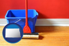 north-dakota a bucket and mop on a hardwood floor