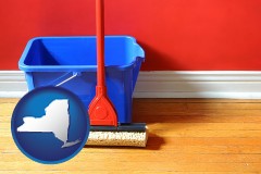 new-york map icon and a bucket and mop on a hardwood floor