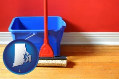 rhode-island map icon and a bucket and mop on a hardwood floor